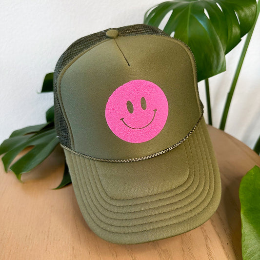 the trucker - bright pink smiley on olive