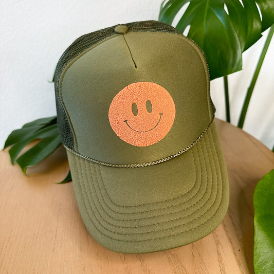 the trucker - rust smiley on olive