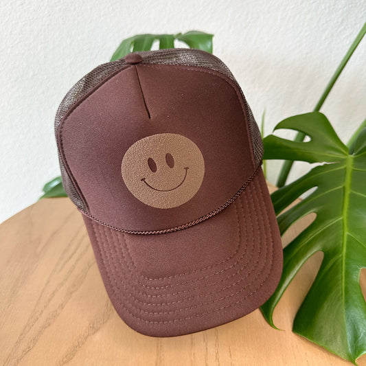 the trucker - brown smiley on chocolate