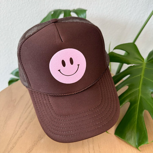 the trucker - light pink smiley on chocolate