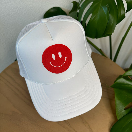 the trucker - red smiley on white